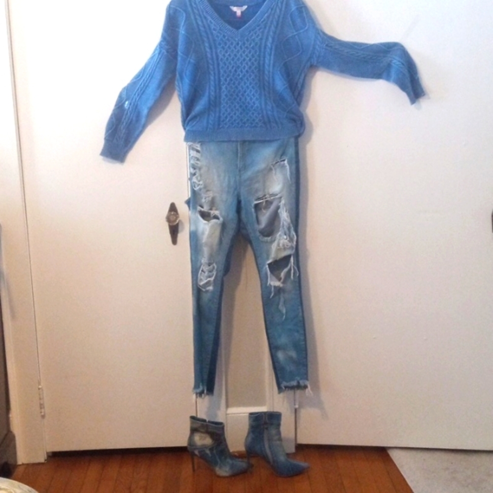 An Outfit. SWEATER, JEANS AND BOOTS